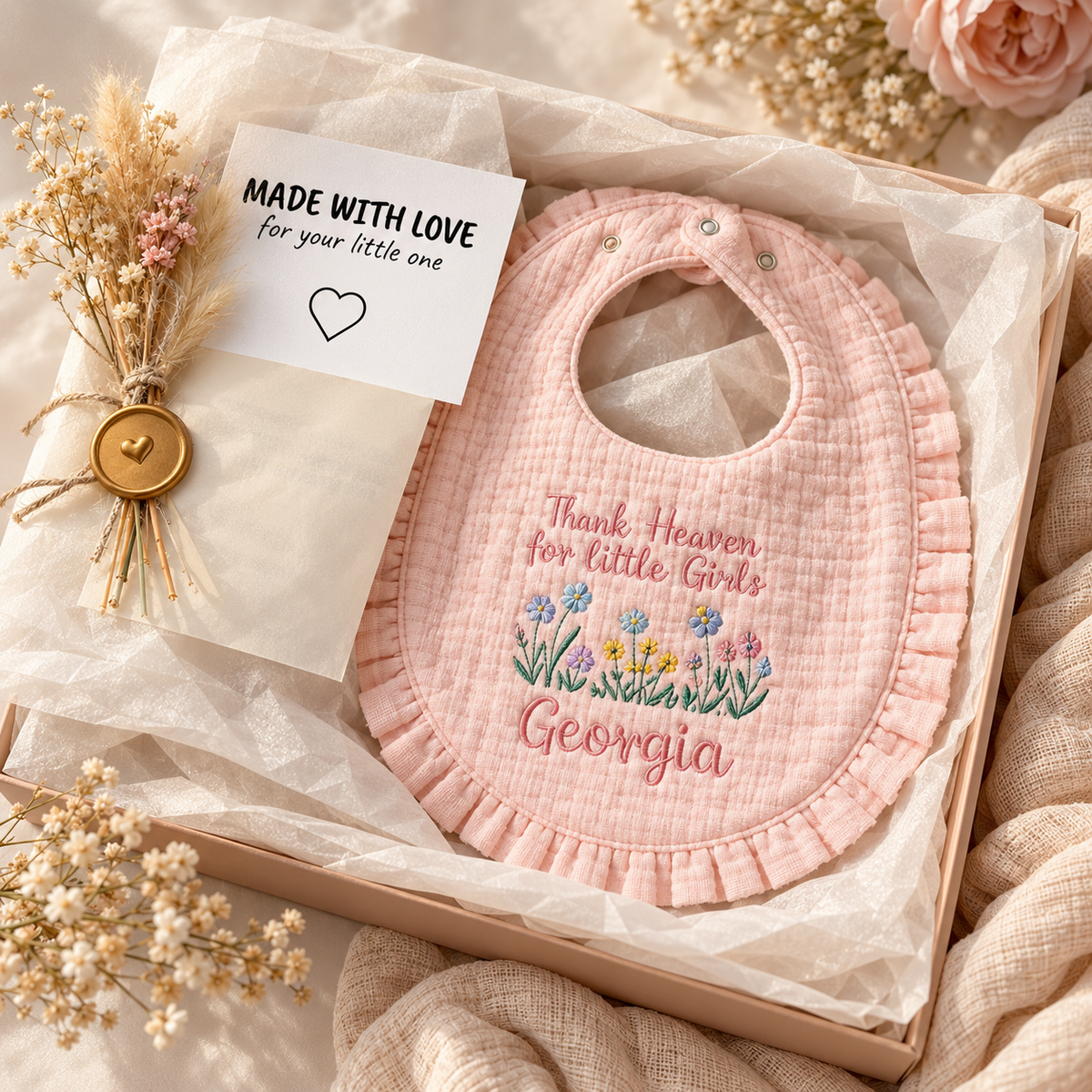 Personalized wildflower ruffle bib gift presentation