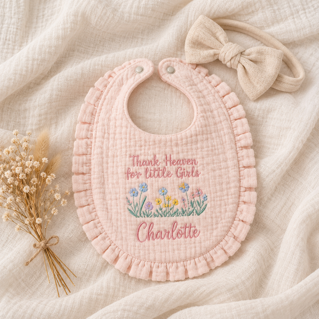 Personalized wildflower ruffle baby bib in blush pink