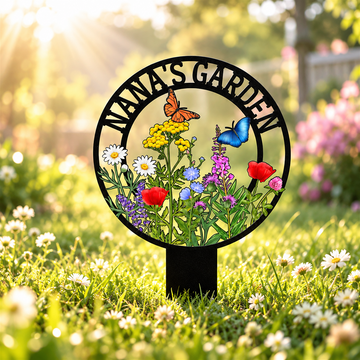 Personalized floral garden stake sign in an outdoor garden