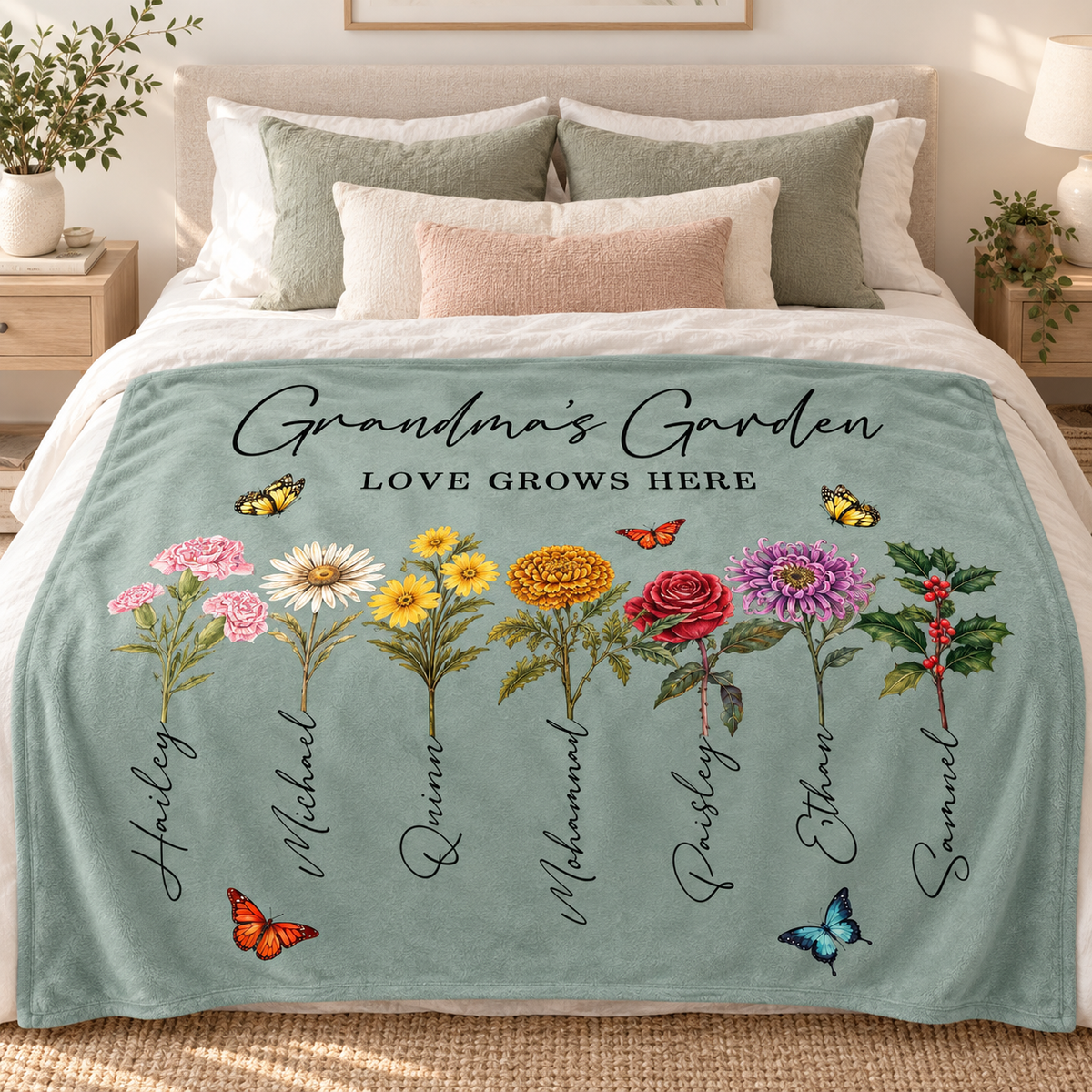 Personalized birth flower blanket on bed